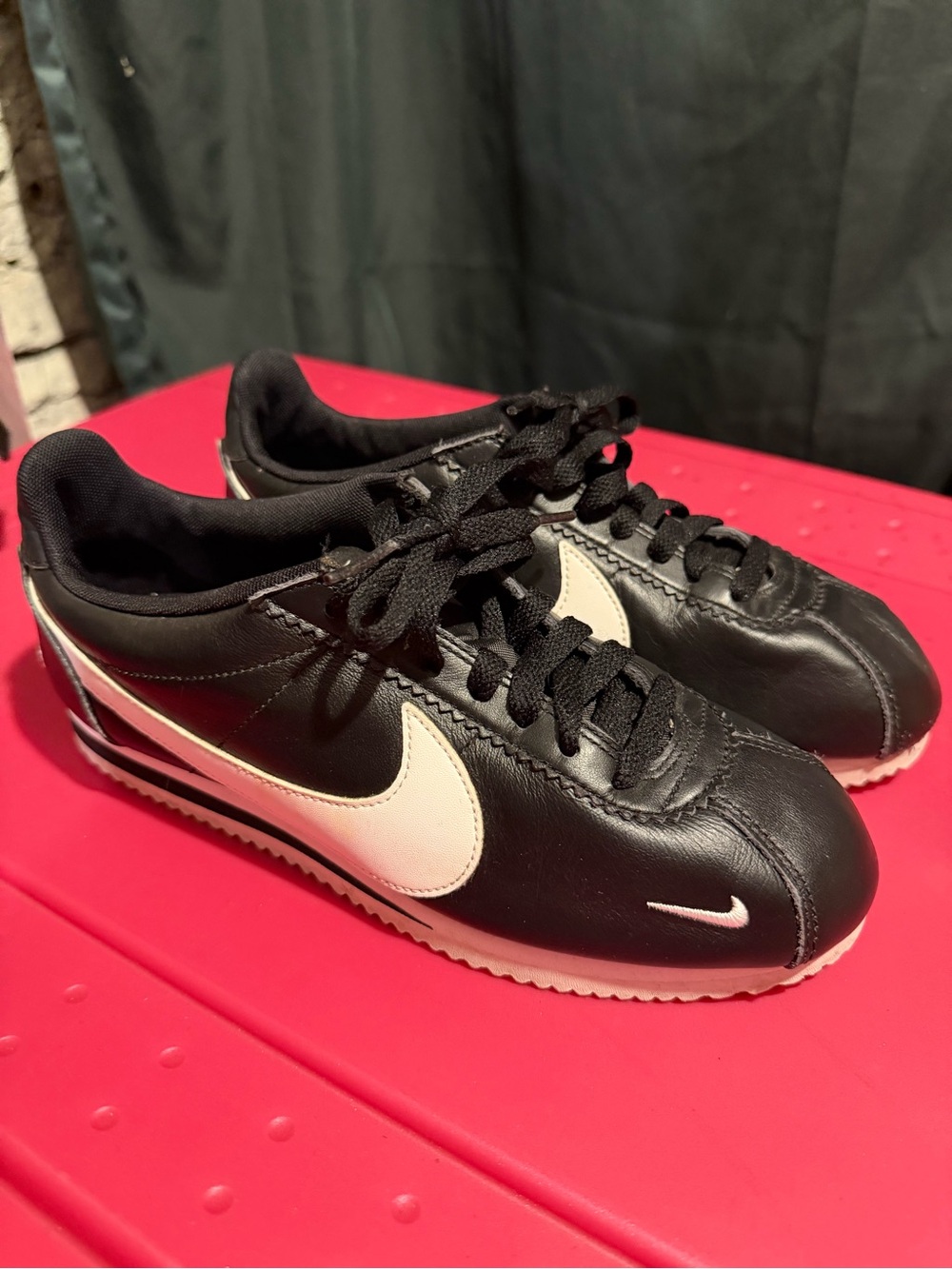 Nike Black Leather Sneakers with White Swoosh